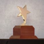 Gold Star Casting Mounted on Wood Base